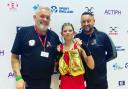 Brooke Matthews with her coaches and Golden Gloves after national victory. Picture: Triple A Boxing Club