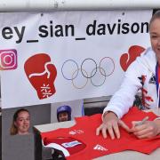 Charley Davison signs a Team GB vest at the special ceremony in Lowestoft.