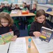 Bookworms! Children from Red Oak Primary enjoying reading. Picture: Red Oak Primary School