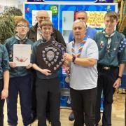 District Commissioner Mel Buck presenting the trophy to 14th Lowestoft.