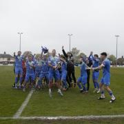 Celebrations as Lowestoft Town FC lift the trophy as Isthmian League North Division champions. Picture: Shirley D Whitlow