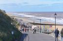Coastal towns still extremely busy despite governement instructing people to stay indoor due to Corona Virus. Cromer beach Pictures: BRITTANY WOODMAN