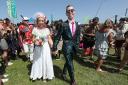 A wedding celebration for Jack Watney, 32, and Sarah Adey, 31, at The Croissant Neuf bandstand in the Green Fields area of the Glastonbury Festival at Worthy Farm, Pilton, Somerset. PRESS ASSOCIATION Photo. Picture date: Thursday June 27, 2019. See PA sto