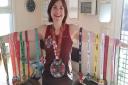 Waveney Valley AC member Kirsty Howe displays her medals Picture: Kirsty Howe