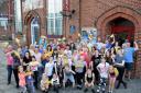 The cast of the Lowestoft Players production of \'The Sound of Musicals\' holding 20 golden tickets which are being given away for their anniversary show. Picture: Stephen Wilson.