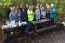 Two of the new picnic benches that have been installed, with Cllr Mary Rudd and the work party group of GWCP.