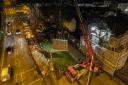 Work to remove the Banksy seagull mural takes place at night. Picture: Oliv3r Drone Photography