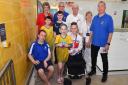 Some of the Suffolk swimmers including members of Team Waveney, officials, members of Lowestoft Lions and Team GB Paralympic team member Ellie Challis