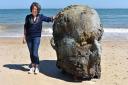 Genevieve Christie, Chief Executive Officer at First Light Festival CIC with the Chthonic Head on Lowestoft's South Beach. Picture: Mick Howes