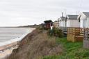 The clifftop chalets seaward of Arbor Lane in Pakefield are facing demolition. One has already been knocked down.