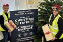 Lowestoft Central Project team members James Wareham (left) & Jacqui Dale (right) preparing for this years Lowestoft station Christmas Fayre.