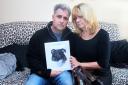 Martin and Jacqueline Gowing with a photo of Freya, and her lead. Picture: Mick Howes