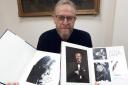 Rob French, ephemera valuer at Richard Winterton Auctioneers, with signatures from Jack Lemmon and Frank Sinatra that featured in the auction. Picture: Richard Winterton Auctioneers