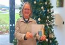 Rev Margaret Rittman, St Michael and All Angels Church, Martlesham, collecting her cards from East Suffolk House.