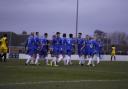 Lowestoft Town FC players celebrate after scoring against Great Wakering Rovers