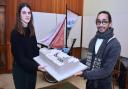 Katarina Santic and Shemal Rahman, of architect firm HAT Projects, holding a scale model of what Lowestoft Town Hall could look like when finished