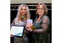 Ann-marie Doggett, of Magnus PR (left) collects her award. Picture: East Suffolk Awards