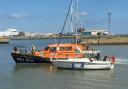 Lowestoft Lifeboat with the stranded yacht. Picture: Mick Howes