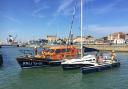 RNLI Lowestoft lifeboat ‘Patsy Knight’ with the stranded Trimaran. Picture: Mick Howes