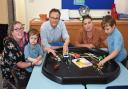 Waveney MP Peter Aldous with staff and pupils in one of the newly renovated rooms at Warren School, Oulton Broad, Lowestoft. Picture: Mick Howes