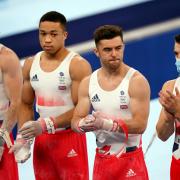 Great Britain's (left-right) James Hall, Joe Fraser, Giarnni Regini-Moran and Max Whitlock during the Artistic Gymnastics - Final at the Ariake Gymnastics Centre on the third day of the Tokyo 2020 Olympic Games in Japan.