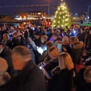 The crowds gather at a previous Carols on the Quay event in Oulton Broad. Picture: Mick Howes