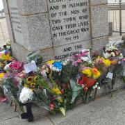 Further flowers have been laid alongside tags featuring poignant messages in tribute to Her Majesty The Queen on Royal Plain, Lowestoft.