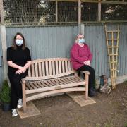 Lesley Saunders and Debbie Norman in the memorial garden.