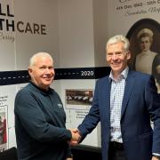 Cavell Healthcare managing director Gordon Anderson (left) and ECCH chief executive Ian Hutchison.