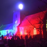 The lights displayed for the outdoor community churchyard carols at St Michael's in Oulton.