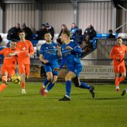 Goalscorer Kyle Haylock (in orange) for Lowestoft Town FC against Bury Town. Picture: Shirley D Whitlow