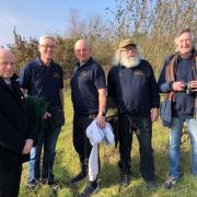 Greater Anglia's Alan Neville, left with members of North Lowestoft Men's Shed at the former station cattle dock. Picture: Wherry Lines CRP Lowestoft Central Project