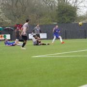 Adam Hipperson shoots with Shaun Bammant on the ground. Picture: Shirley D Whitlow