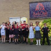 A thumbs up from pupils at Red Oak. Picture: Red Oak Primary School