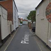 Pinkney's Lane Southwold. Inset: A Suffolk Constabulary officer. Pictures: Google Images/Newsquest