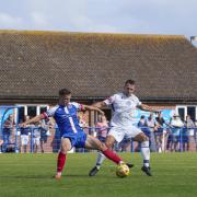 Lowestoft Town's Jake Reed, white, was on target once more hitting a brace in the pre-season friendly at Leiston, which ended in a 2-2 draw. Picture: Shirley D Whitlow