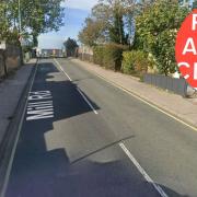 Mill Road, Kirkley in Lowestoft. Inset, a road closure sign. Pictures: Google Images/Newsquest