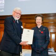 John Wylson, Vice President of the Lowestoft-based Excelsior Trust receives his award from HRH The Princess Anne. Picture: Paul Wyeth/RYA