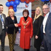 Mayor of Lowestoft, Sonia Barker (centre), shaking hands with Jane Wood (Owner and Executive Chair), Chloe Barnett (Director of Operations) and Professor Dave Muller (Board Member) and Carl Rogers (far left, Centre Manager and Tutor)