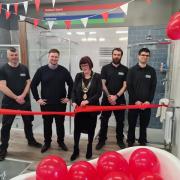 Staff from Graham The Plumbers' Merchant in Lowestoft with the mayor, Sonia Barker, at the official unveiling of the new showroom.