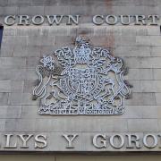 A man from Suffolk appeared at Swansea Crown Court accused of attacking a man with a knife