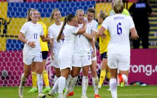 Lauren Hemp, left, with Beth Mead (centre) after Mead scored England's first goal of the game during the UEFA Women's Euro 2022 semi-final match at Bramall Lane, Sheffield.