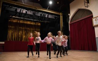 Junior performers from the Lowestoft Players\' pantomime Beauty and the Beast having fun during rehearsals at the Players Theatre, Lowestoft.