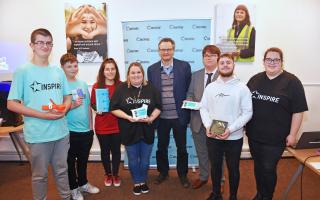 Inspire students are raising funds for bleed control kits in Lowestoft. Pictured with Waveney MP Peter Aldous. Picture: Mick Howes