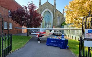 The MAF plane in a churchyard. Picture: MAF