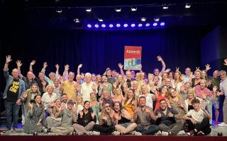 Members of The Lowestoft Players have given Aldreds Estate Agents, Lowestoft a big shout for helping to promote their next production – Elf The Musical. Picture: Lisa Watson