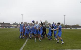 Celebrations as Lowestoft Town FC lift the trophy as Isthmian League North Division champions. Picture: Shirley D Whitlow